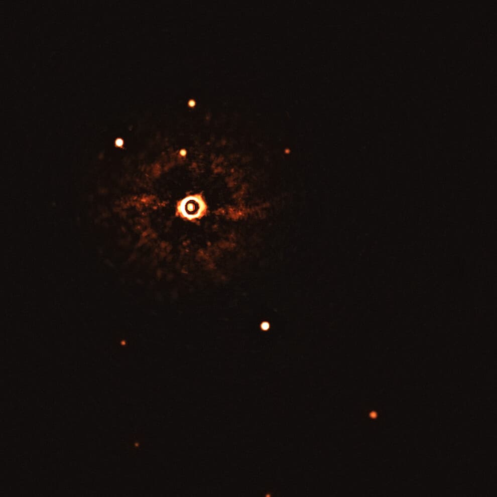 First Ever Image of Exoplanets around a sunlike star. Credit: ESO/Bohn et al.