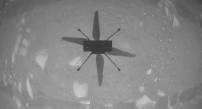 Ingenuity Helicopter captured an imaged of its own shadow as it hovered above Mars during its maiden flight. Credit: NASA