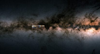 This image shows a section of the side view of the Milky Way as measured by ESA’s Gaia satellite. The dark band consists of gas and dust, which dims the light from the embedded stars. The Galactic Centre of the Milky Way is indicated on the right of the image, shining brightly below the dark zone. The box to the left of the middle marks the location of the “Maggie” filament. It shows the distribution of atomic hydrogen. The colours indicate different velocities of the gas. [less] Image: ESA/Gaia/DPAC, CC BY-SA 3.0 IGO & T. Müller/J. Syed/MPIA