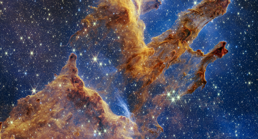 The Pillars of Creation are set off in a kaleidoscope of color in NASA’s James Webb Space Telescope’s near-infrared-light view. The pillars look like arches and spires rising out of a desert landscape, but are filled with semi-transparent gas and dust, and ever changing. This is a region where young stars are forming – or have barely burst from their dusty cocoons as they continue to form. Credits: NASA, ESA, CSA, STScI; Joseph DePasquale (STScI), Anton M. Koekemoer (STScI), Alyssa Pagan (STScI).