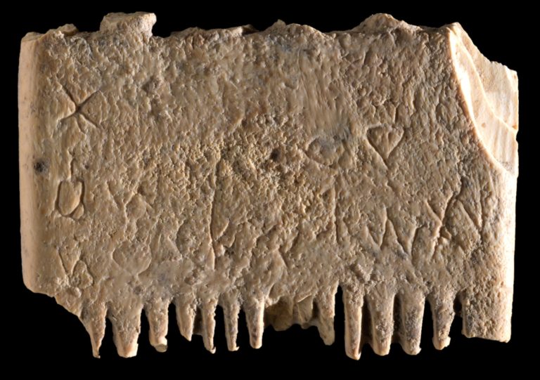Canaanite fine toothed ivory comb discovered in 2017 and now revealed to have the oldest known inscription in the Phoenician writing system that eventually evolved into the alphabet we and so many other cultures use today. CREDIT: DAFNA GAZIT, ISRAEL ANTIQUITIES AUTHORITY