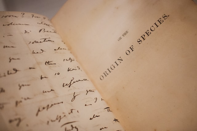 First Page of Darwin's Origin of Species showing title of the book. By Fernando Venzano on Unsplash
