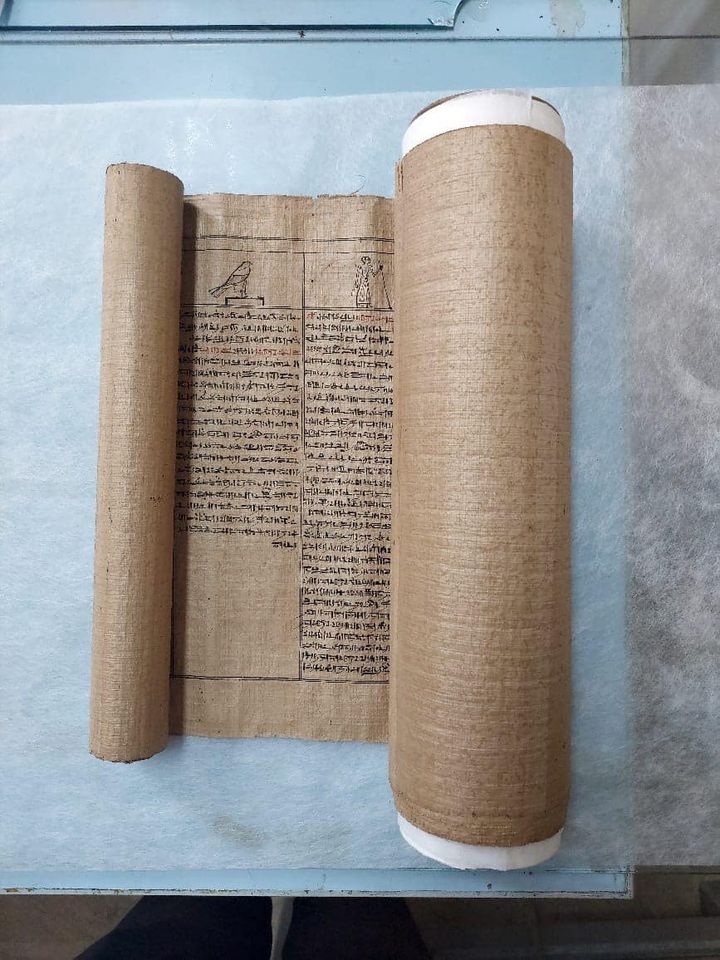 The 52-foot-long scroll was found at Saqqara in May 2022. It contains chapters from the Book of the Dead. It was recently restored and translated into Arabic and is now on display at The Egyptian Museum in Cairo. The text is written in hieratic, a script derived from hieroglyphs.