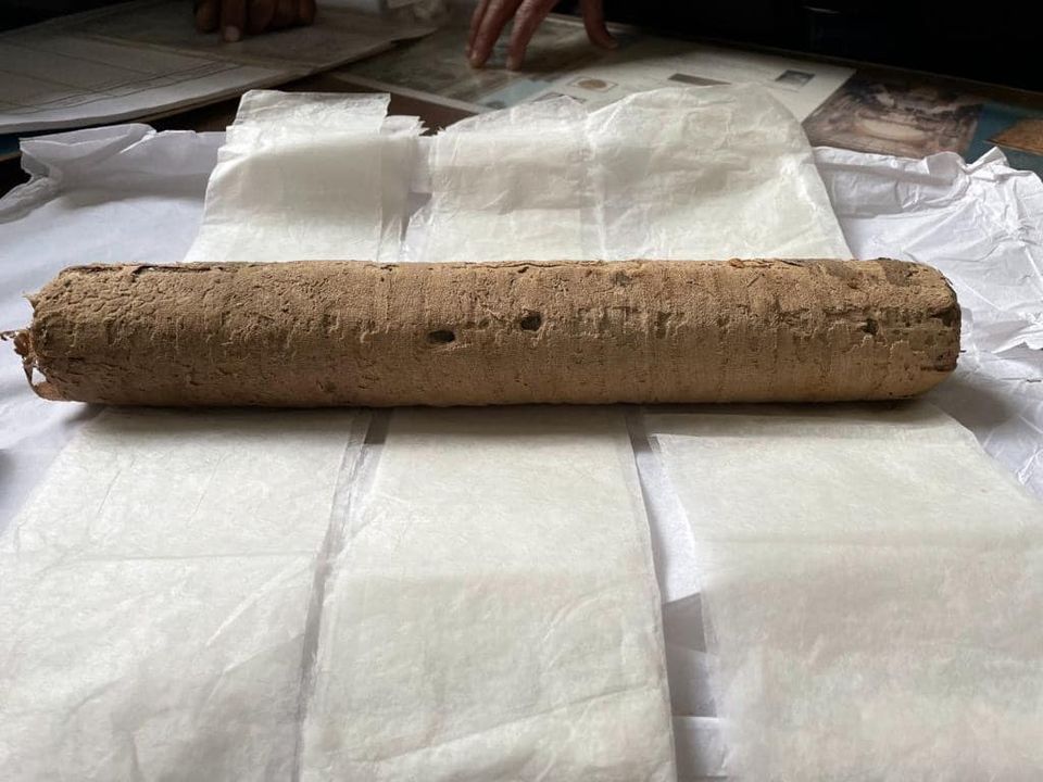 Rolled up 52-foot-long scroll that was found at Saqqara in May 2022. It contains chapters from the Book of the Dead. It was recently restored and translated into Arabic and is now on display at The Egyptian Museum in Cairo. The text is written in hieratic, a script derived from hieroglyphs.