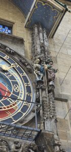 Death depicted as a skeleton and other figures surrounding the right of the astronomical dial of the Prague Astronomical Clock. Image: 360onhistory.com