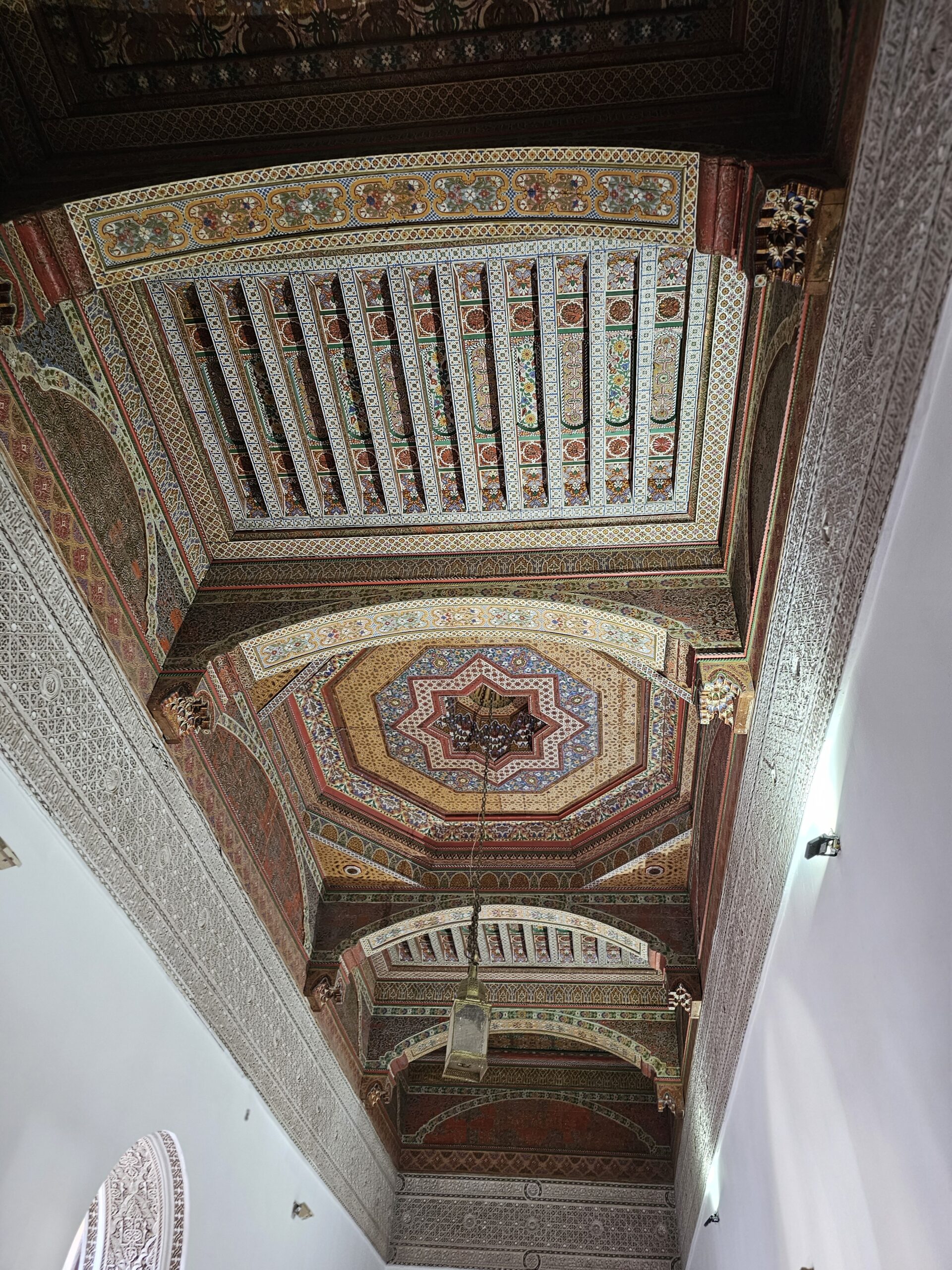A beautifully designed and colourful ceiling at Bahia Palace, Marrakesh. A fine example of Islamic decor. Image by 360onhistory.com
