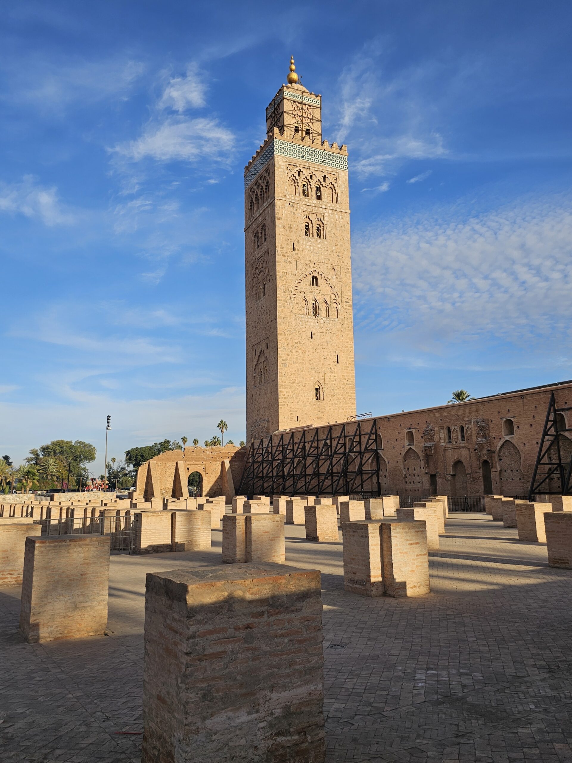 Sideview of the 12th century Koutoubia Mosque and its front yard with pillars, Marrakesh. Image by 360onhistory.com