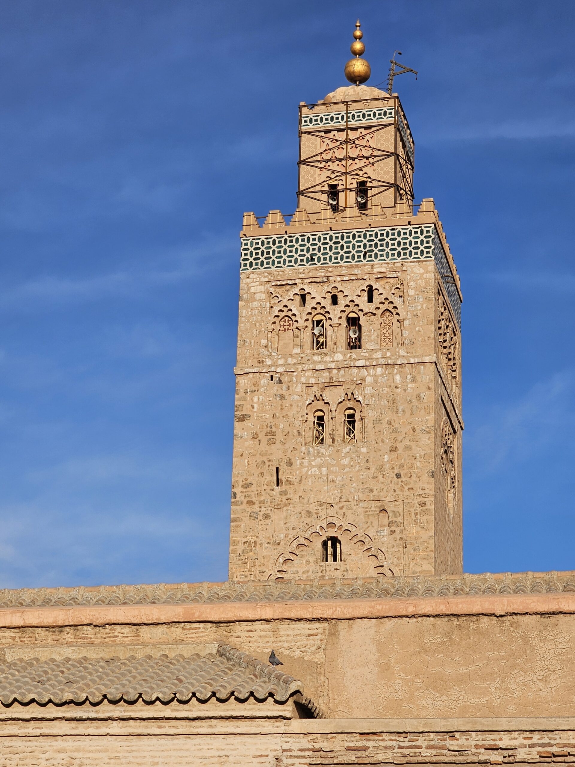 Top of the minaret and front wall of Koutoubia Mosque, Marrakesh. Image by 360onhistory.com