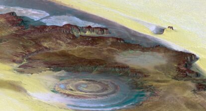 Richat Structure: A topographic reconstruction scaled 6 to1 on the vertical axis from satellite photos. False colouring as follows: Brown bedrock, Yellow or white sand, Green vegetation, Blue salty sediments